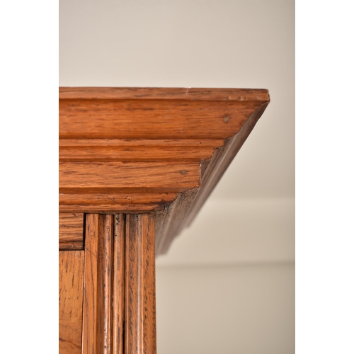 262 - A matching pair of late 19th century Victorian oak bookcase cabinets. Each having led lined glazed d... 