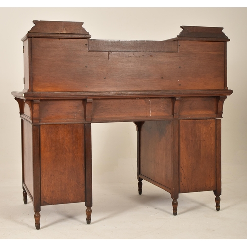 263 - A 19th century Victorian Maple & Co walnut Dickens writing table desk. The desk having a raised gall... 