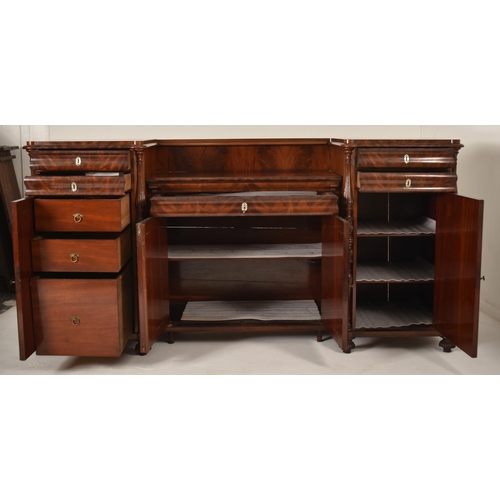 266 - A 19th century Victorian inverted breakfront flame mahogany sideboard credenza / buffet. The sideboa... 