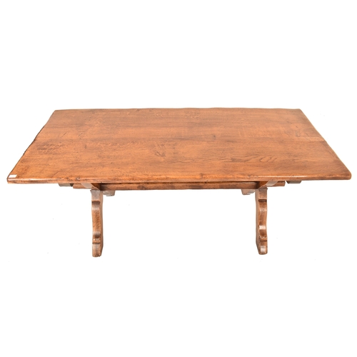 279 - A Jacobean / Commonwealth Revival oak refectory farmhouse dining table. The table having a rectangul... 