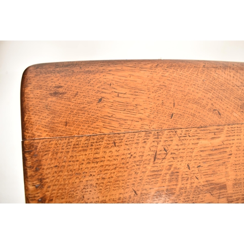 279 - A Jacobean / Commonwealth Revival oak refectory farmhouse dining table. The table having a rectangul... 