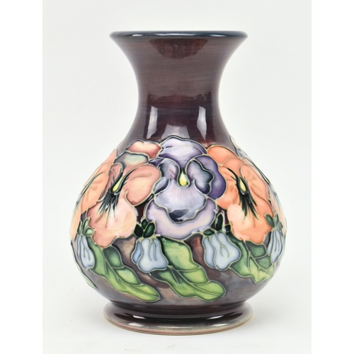 74 - William Moorcroft - a vintage 20th century squat Moorcroft vase in the Pansy pattern. The vase with ... 