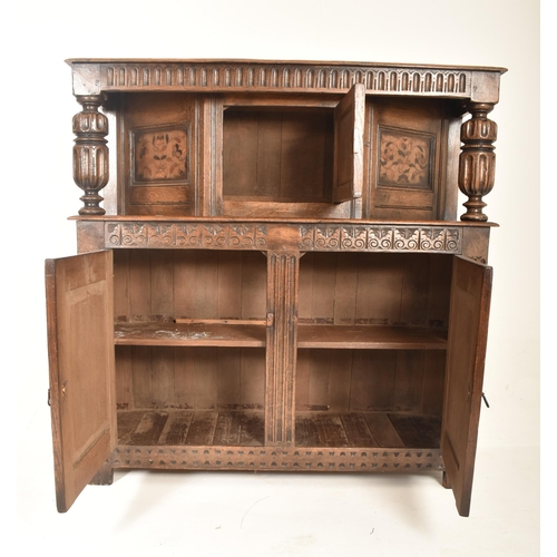 287 - An Elizabethan inspired 19th century carved oak & marquetry court cupboard credenza. The cupboard ha... 