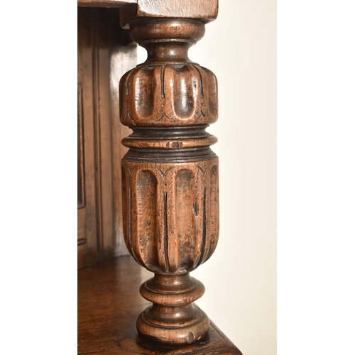 287 - An Elizabethan inspired 19th century carved oak & marquetry court cupboard credenza. The cupboard ha... 