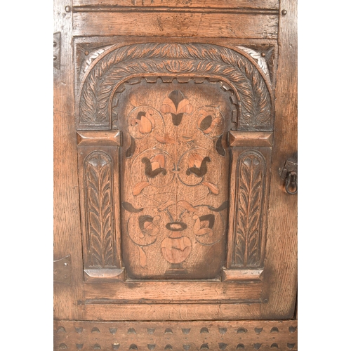 287 - An Elizabethan inspired 19th century carved oak & marquetry court cupboard credenza. The cupboard ha... 