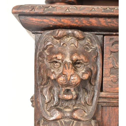 293 - A Flemish Continental 19th century carved oak court cupboard credenza sideboard. The cupboard having... 