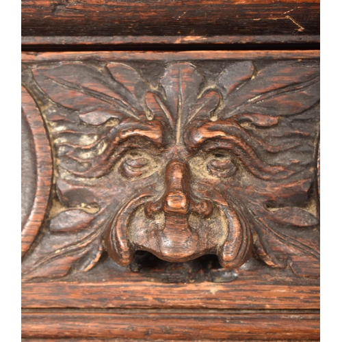 293 - A Flemish Continental 19th century carved oak court cupboard credenza sideboard. The cupboard having... 