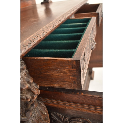 293 - A Flemish Continental 19th century carved oak court cupboard credenza sideboard. The cupboard having... 