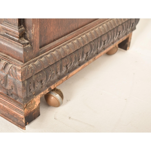 293 - A Flemish Continental 19th century carved oak court cupboard credenza sideboard. The cupboard having... 