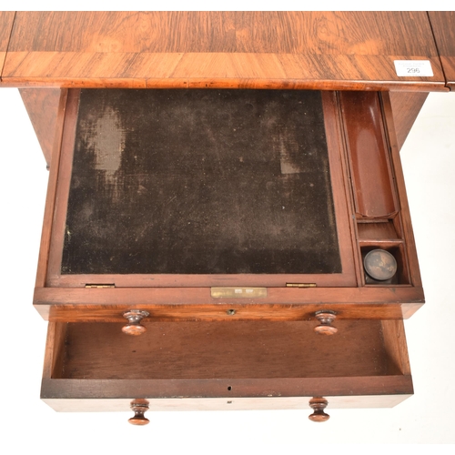 296 - A George IV early 19th century rosewood drop leaf work writing table. The table having a straight to... 