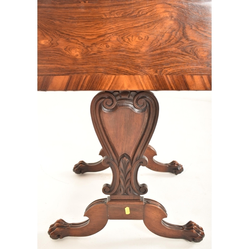 296 - A George IV early 19th century rosewood drop leaf work writing table. The table having a straight to... 