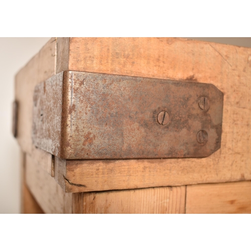 298 - An Edwardian 20th century beech & pine butcher's block. The table having a rectangular top with meta... 