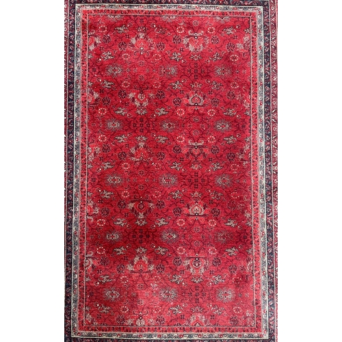 341 - A Royal Keshan pure new wool pile Afghan floor carpet rug. The rug of red ground with central panel ... 