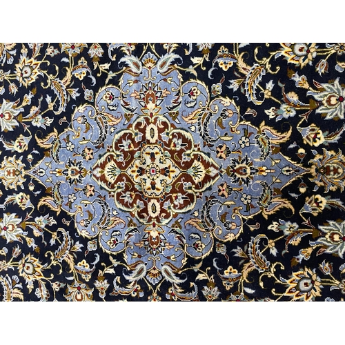 346 - A large early 20th century Central Persian Islamic Kashan floor carpet rug. The rug having a central... 