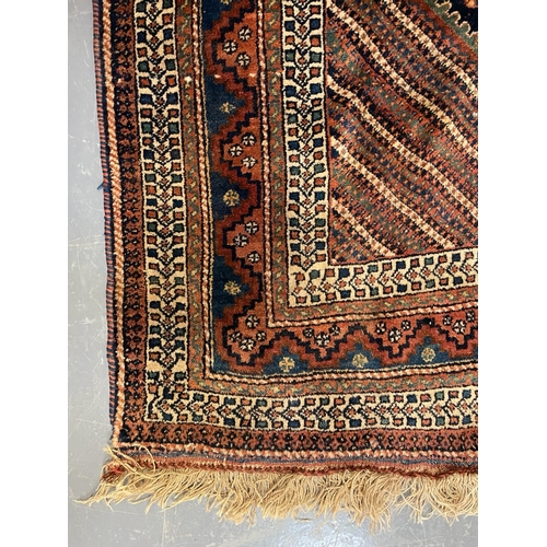 362 - A 19th century Persian Turkish floor carpet rug. The rug featuring central geometric pattern with bi... 