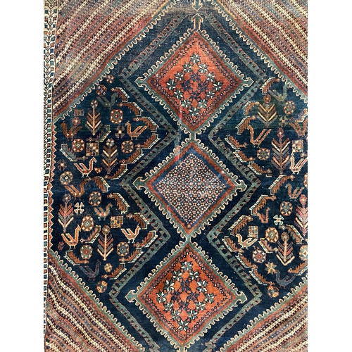 362 - A 19th century Persian Turkish floor carpet rug. The rug featuring central geometric pattern with bi... 