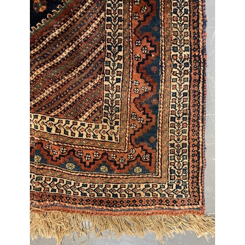 362 - A 19th century Persian Turkish floor carpet rug. The rug featuring central geometric pattern with bi... 