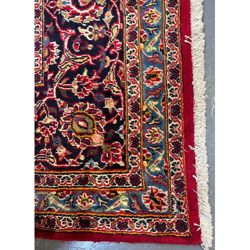 408 - A 20th century Central Persian Islamic Kashan floor carpet rug. The rug having a central medallion i... 