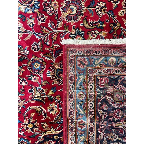 408 - A 20th century Central Persian Islamic Kashan floor carpet rug. The rug having a central medallion i... 