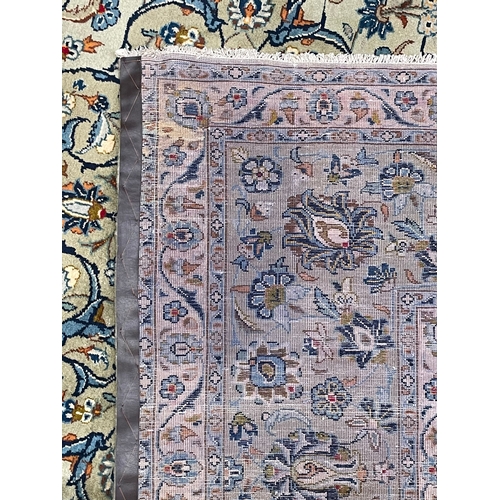 421 - An early 20th century Central Persian Islamic Kashan floor carpet rug. The rug having a mint green g... 