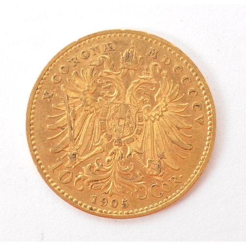 530A - 10 Corona 1905 Austrian Franz Joseph I 900 gold coin. Imperial Eagle superimposed with the Austrian ... 