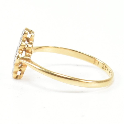 1 - An 18ct gold platinum and diamond cluster ring. The ring set with a cluster of nine round brilliant ... 