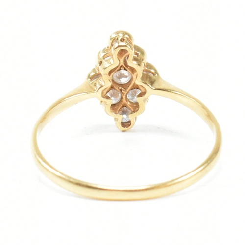 1 - An 18ct gold platinum and diamond cluster ring. The ring set with a cluster of nine round brilliant ... 