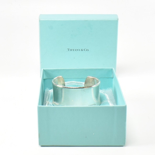 100 - A Tiffany & Co 1837 sterling silver wide cuff bangle. The Tiffany open cuff bangle stamped with 'T &... 