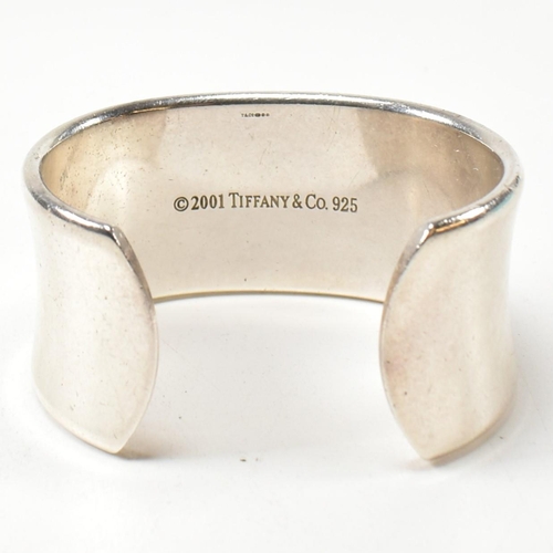 100 - A Tiffany & Co 1837 sterling silver wide cuff bangle. The Tiffany open cuff bangle stamped with 'T &... 