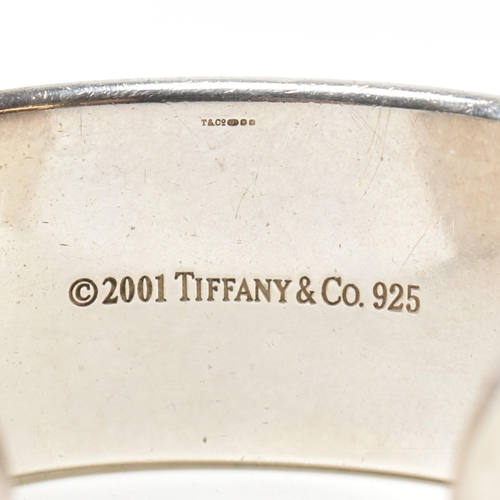 100 - A Tiffany & Co 1837 sterling silver wide cuff bangle. The Tiffany open cuff bangle stamped with 'T &... 