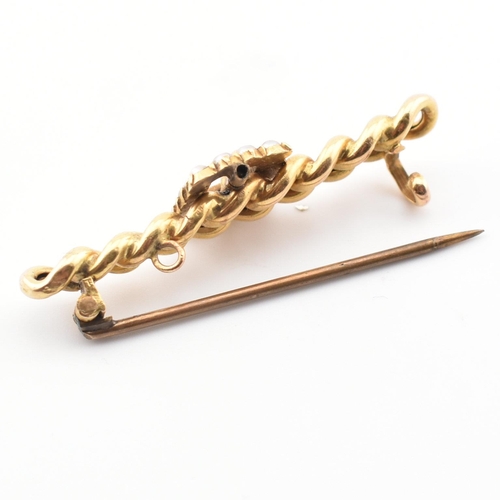 106 - A 19th century 15ct gold Suffragette chain and buckle brooch pin. The brooch having a half pearl set... 