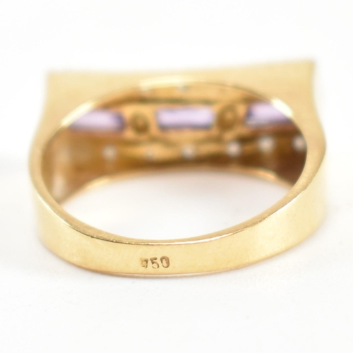 110 - An 18ct gold, amethyst and diamond ring. The ring set with a central row of three east-west baguette... 