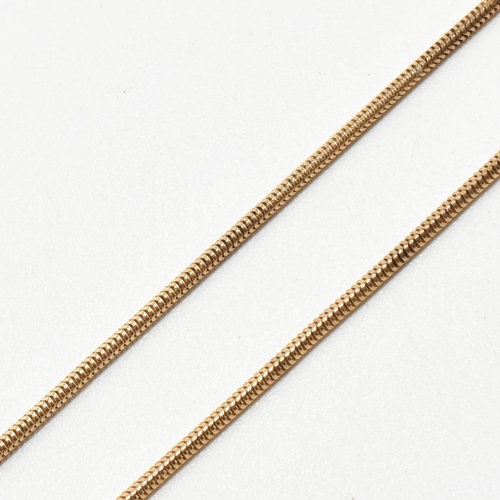 115 - A hallmarked 9ct gold snake chain necklace. The necklace hallmarked with an import mark for Birmingh... 