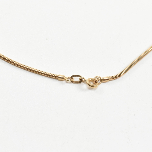 115 - A hallmarked 9ct gold snake chain necklace. The necklace hallmarked with an import mark for Birmingh... 