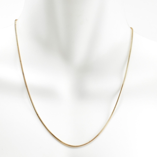 115 - A hallmarked 9ct gold snake chain necklace. The necklace hallmarked with an import mark for Birmingh... 