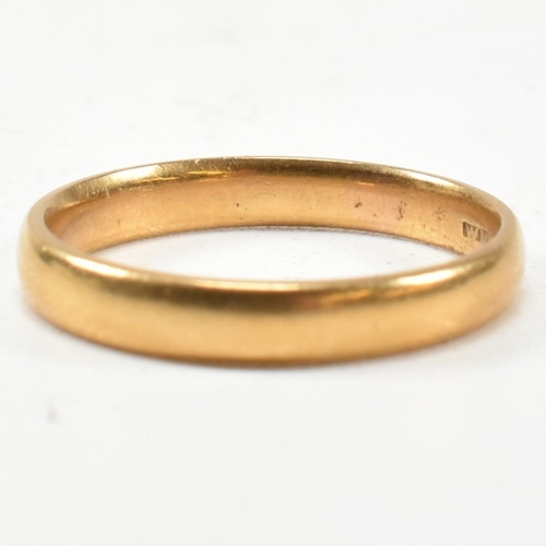 116 - A hallmarked 22ct gold band ring. The ring hallmarked for Birmingham. Size N. Weighs 3.7g. All weigh... 