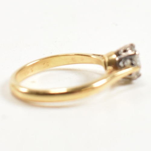 120 - A hallmarked 18ct gold and diamond solitaire ring. The 18ct gold ring set with a single eight claw s... 