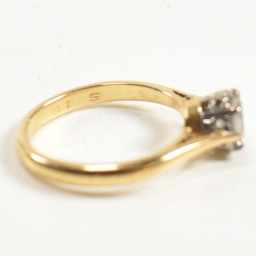 120 - A hallmarked 18ct gold and diamond solitaire ring. The 18ct gold ring set with a single eight claw s... 