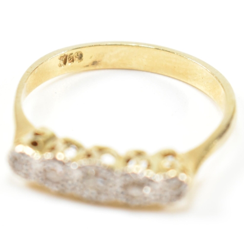 121 - An 18ct gold illusion set diamond five stone ring. The 18ct gold ring having a single row of five il... 