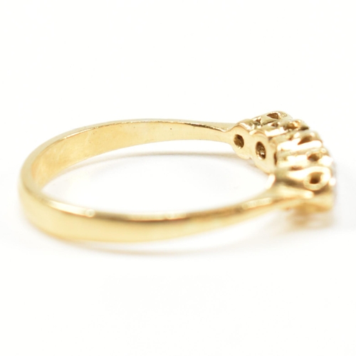 121 - An 18ct gold illusion set diamond five stone ring. The 18ct gold ring having a single row of five il... 