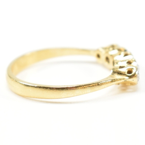 121 - An 18ct gold illusion set diamond five stone ring. The 18ct gold ring having a single row of five il... 