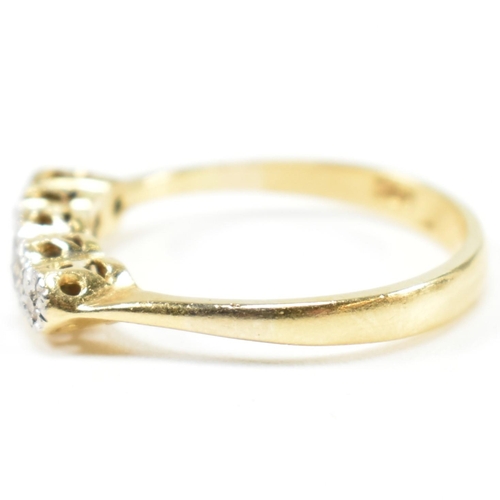 121 - An 18ct gold illusion set diamond five stone ring. The 18ct gold ring having a single row of five il... 