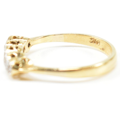 121 - An 18ct gold illusion set diamond five stone ring. The 18ct gold ring having a single row of five il... 