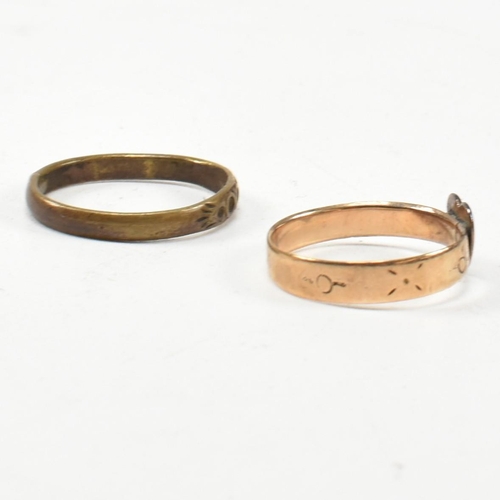 124 - A Victorian hallmarked 9ct gold heart signet ring together with a gold tone metal ring. The heart ri... 