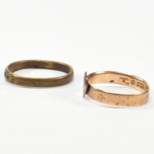 124 - A Victorian hallmarked 9ct gold heart signet ring together with a gold tone metal ring. The heart ri... 