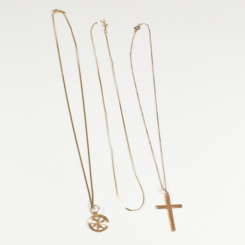 132 - Three 9ct gold necklaces. A hallmarked 9ct gold Maltese cross pendant strung on a curb link chain ne... 