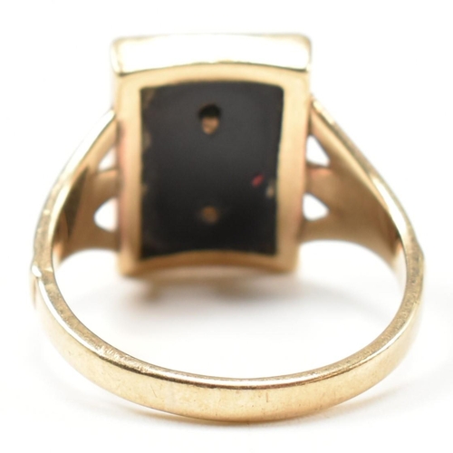 134 - A 9ct gold and onyx Art Deco initial signet ring. The 9ct gold gentleman's signet ring having a rect... 