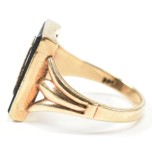 134 - A 9ct gold and onyx Art Deco initial signet ring. The 9ct gold gentleman's signet ring having a rect... 