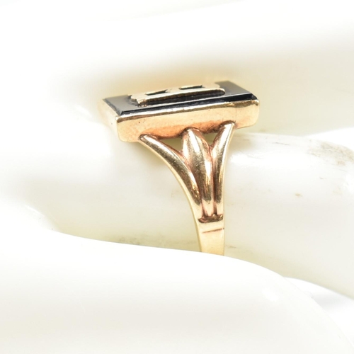 134 - A 9ct gold and onyx Art Deco initial signet ring. The 9ct gold gentleman's signet ring having a rect... 