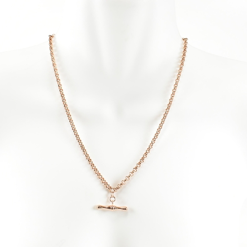 136 - A hallmarked 9ct rose gold albert chain with T-bar pendant. The Italian rose gold belcher chain havi... 